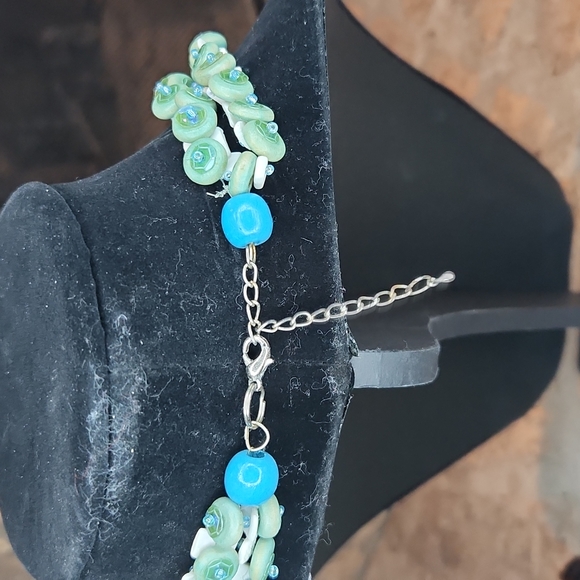 BEACHY DOUBLE STRANDED NWCKLACE FEATURING TURQUOISE COLORED BEADS AND SHELLS - Picture 4 of 4